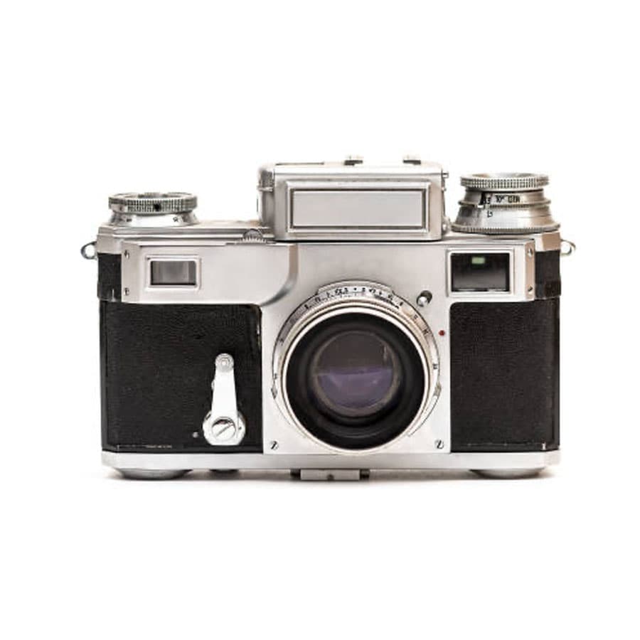 A vintage silver and black film camera
